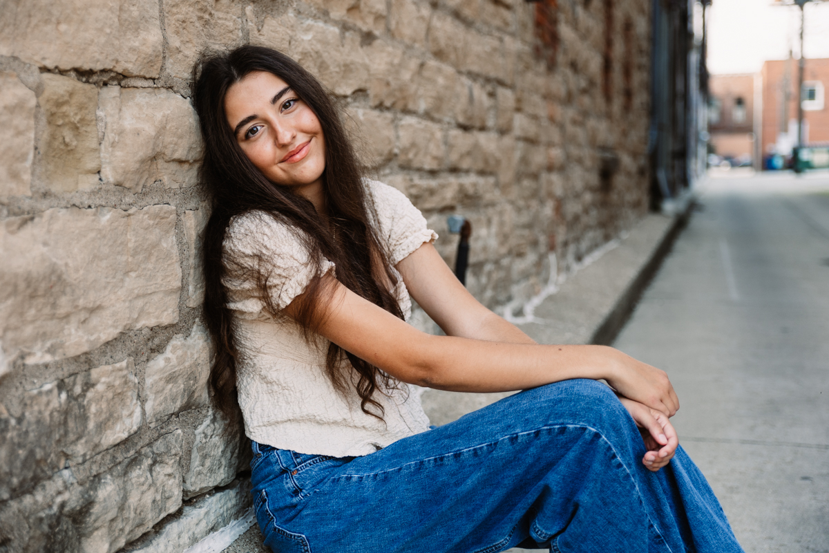 Lovely high school senior from Lincoln Way East in Frankfor poses for a senior pic in downtown Lockport IL.