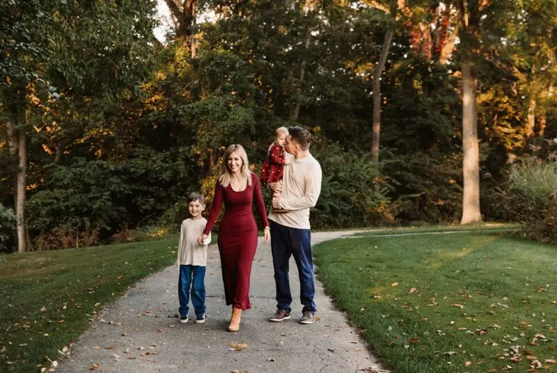 Cute family walking together a the birdhaven greenhouse in Joliet