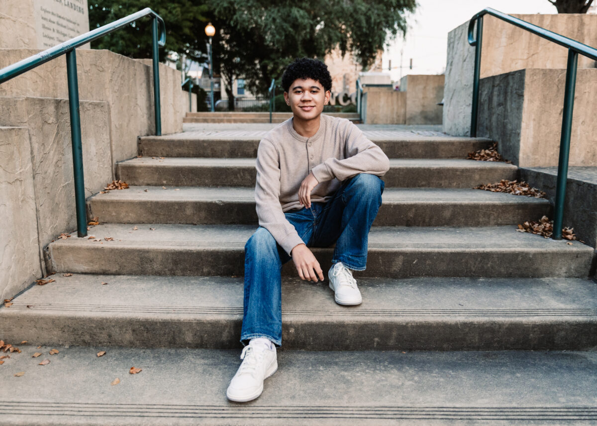 Lincoln Way West High School New Lenox Senior sitting on steps in Lockport IL